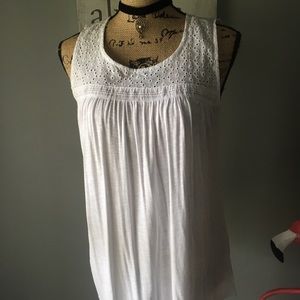 Adorable white womens top.